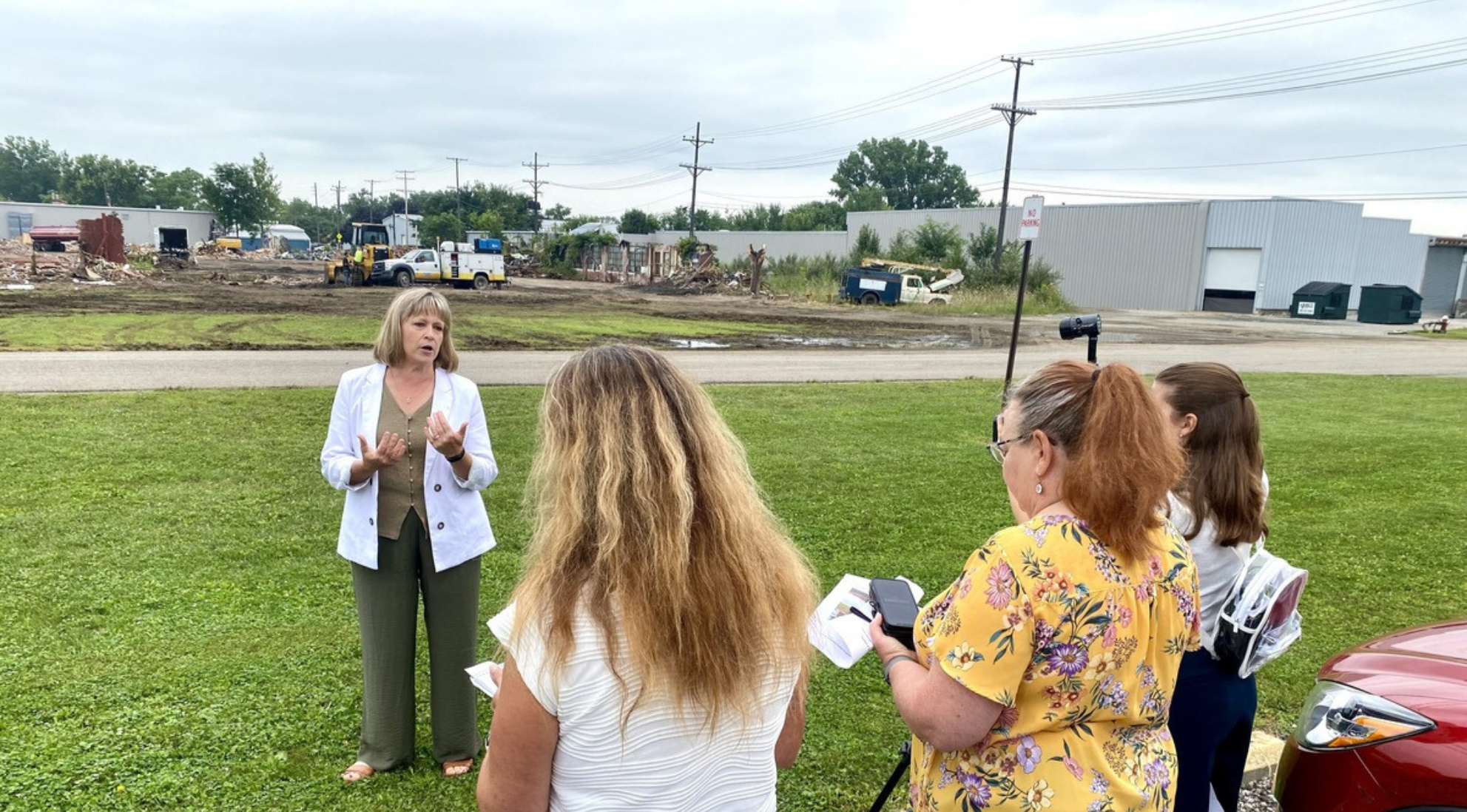 Debora flora speaks to media in front of Sebring demolition.